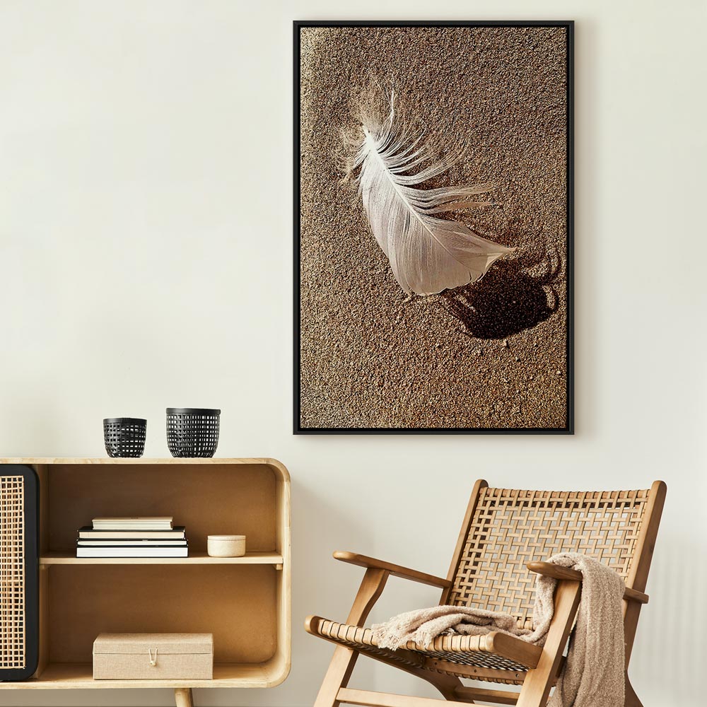 Feather on Sandy Shore Vertical Canvas Print