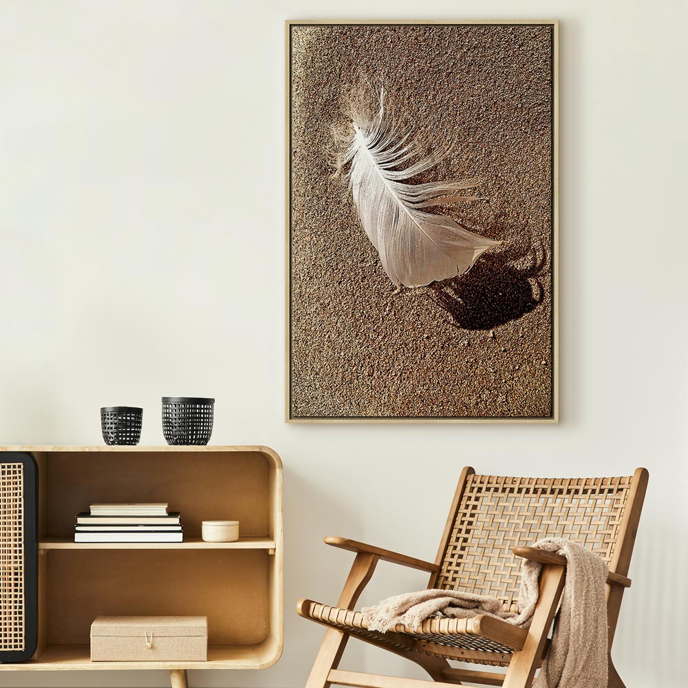 Feather on Sandy Shore Vertical Canvas Print