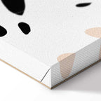 Cat in Monstera Leaves Vertical Canvas Print